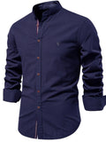 Button-down shirt with embroidered details on the chest area.
